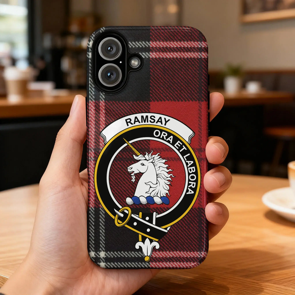 Clan Ramsay tartan phone case — glossy edge-to-edge red plaid print, iPhone shown