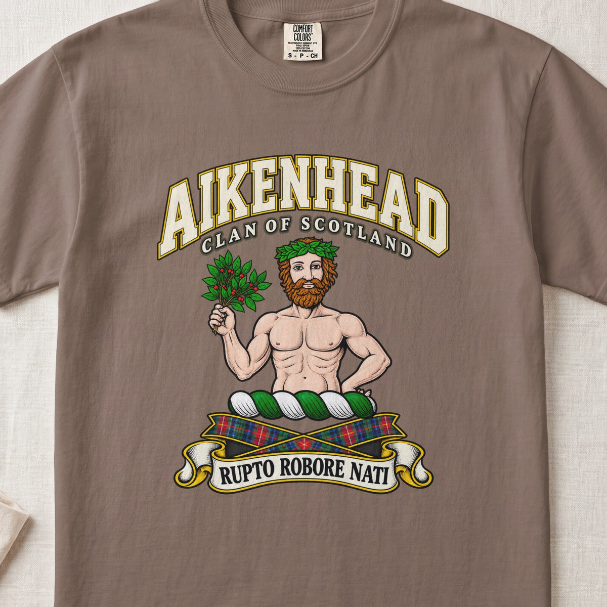 Aikenhead Scottish clan T-shirt in Espresso, front view with a bearded figure holding a leafy branch and motto banner.