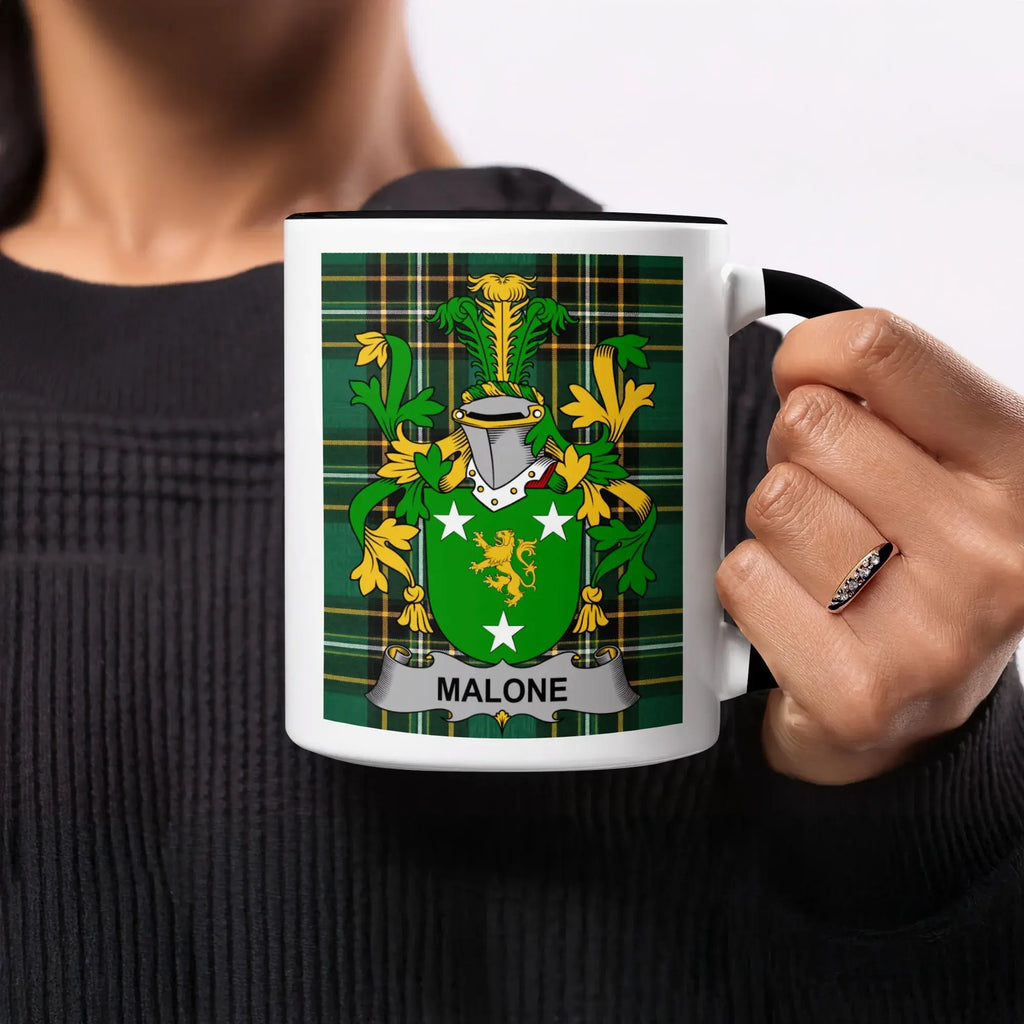 Mug with the Malone family crest on a tartan background.