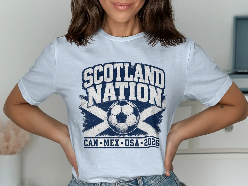 White t-shirt with "SCOTLAND NATION" and soccer ball design.