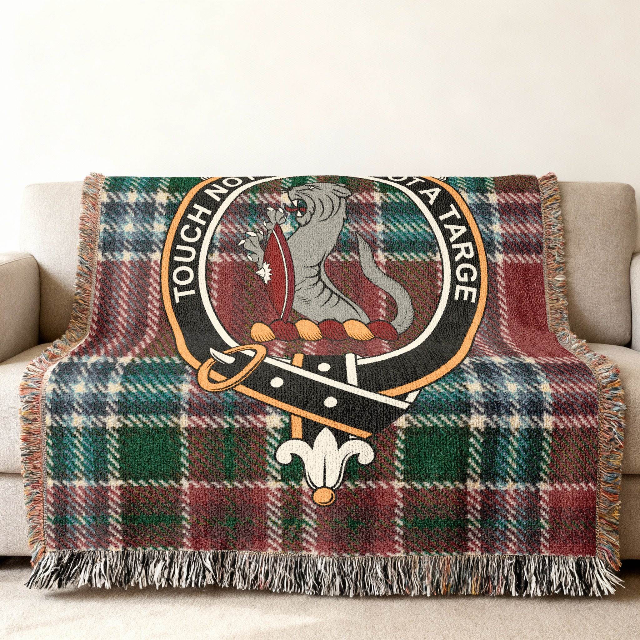 Clan MacBain tartan woven blanket — fringe border detail showing woven pattern and wildcat clan crest
