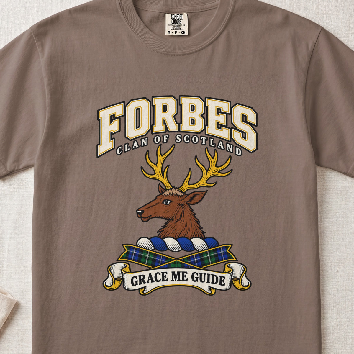 Forbes graphic T-shirt in Espresso brown, front flat lay showing varsity lettering and brown stag head with gold antlers.