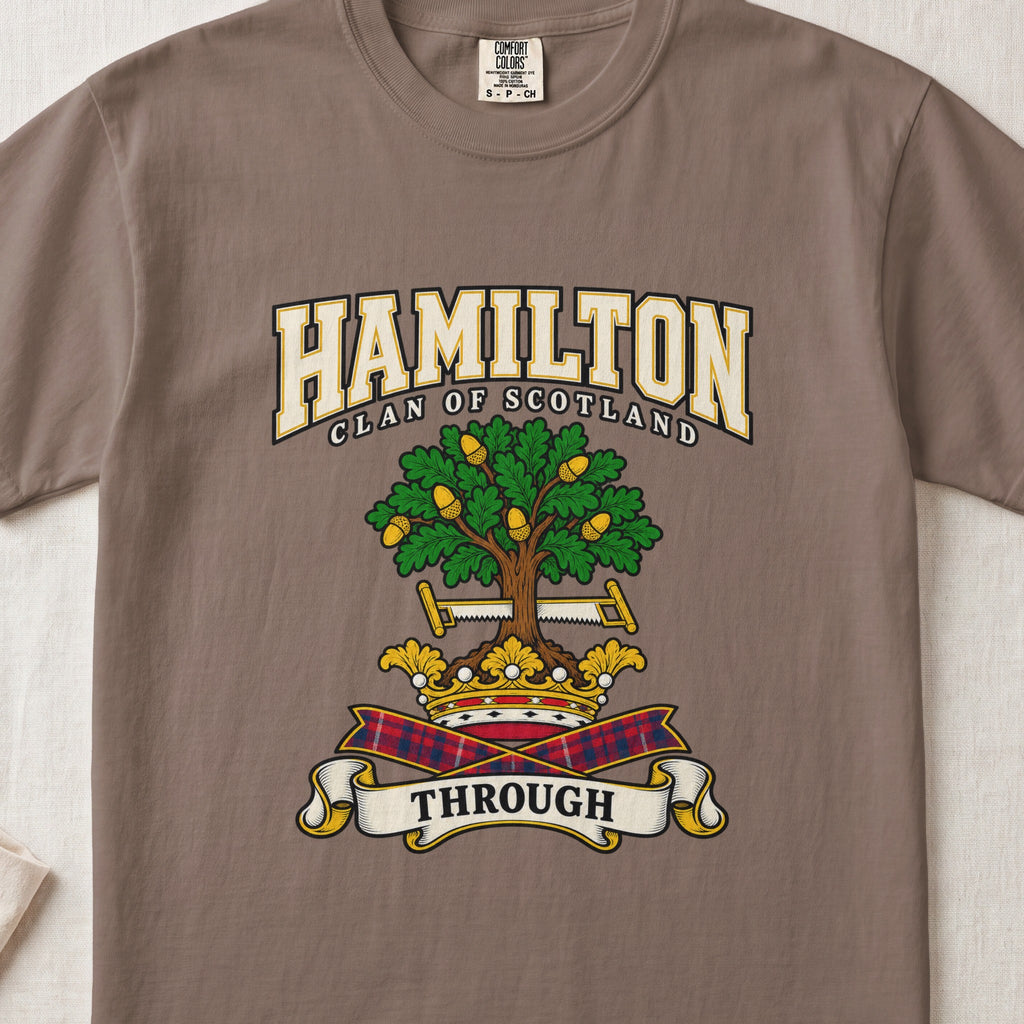 Hamilton graphic T-shirt in Espresso brown, front flat lay showing varsity lettering and green oak-like tree with gold acorns.