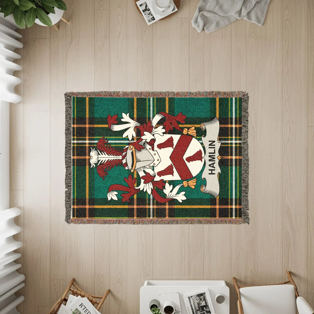 Green plaid woven tapestry with the Hamlin family crest.