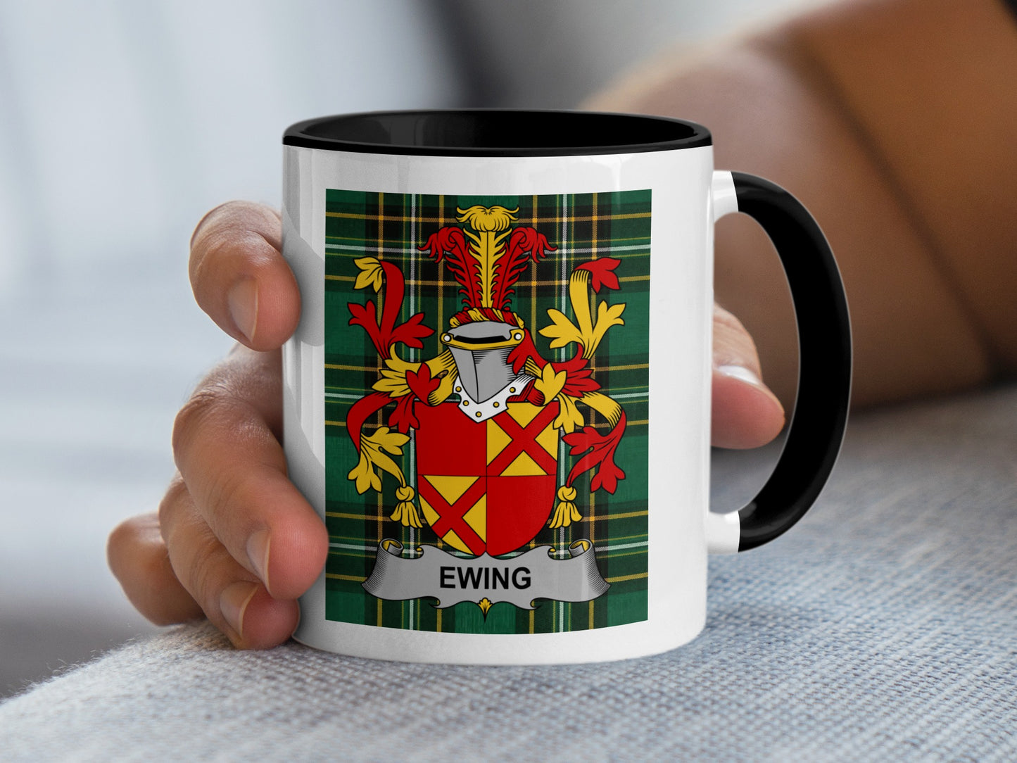 Mug featuring the Ewing family crest on a tartan background.