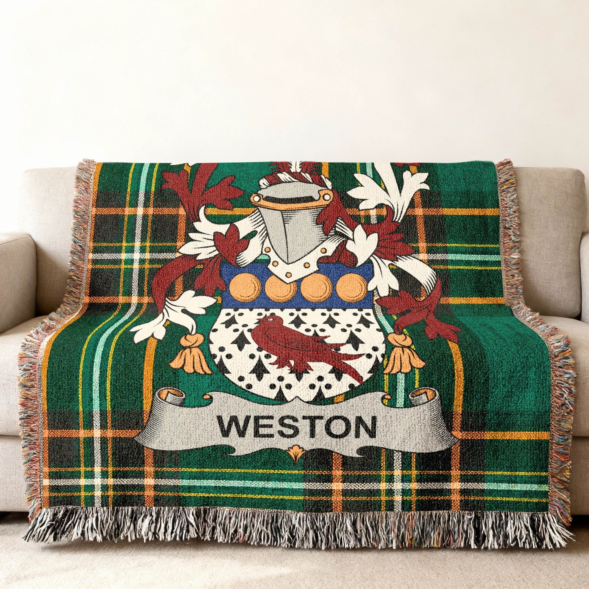 Woven blanket with green plaid and the Weston family crest.