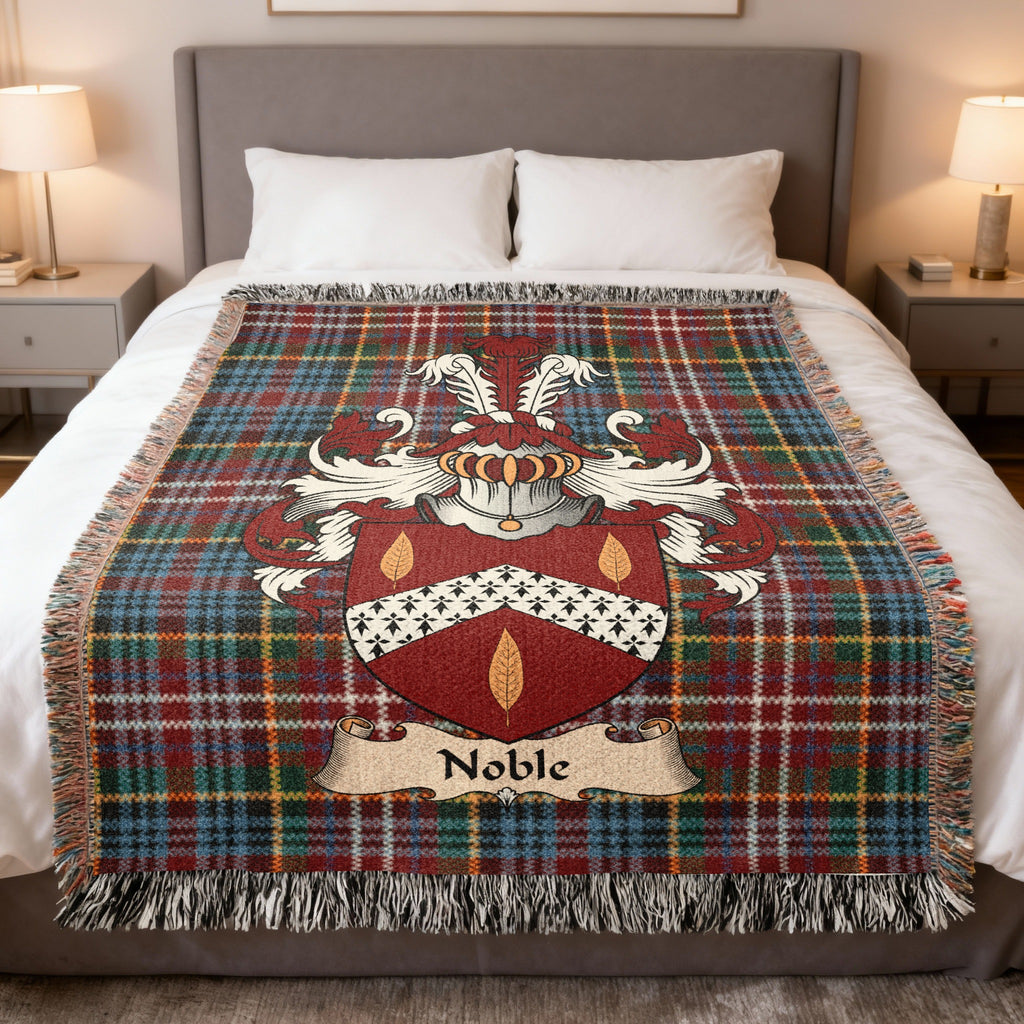 Noble family crest emblem on a Caledonia tartan woven blanket