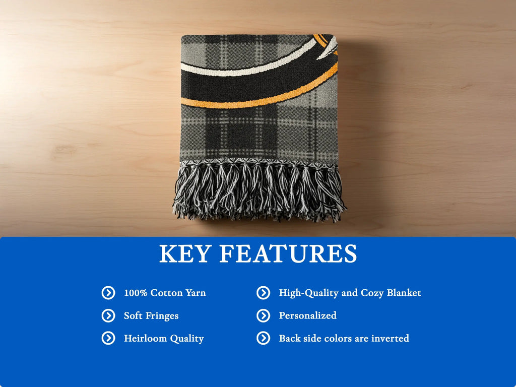 Glendinning woven heritage blanket — 80x60 inch size laid flat showing full crest design and fringe