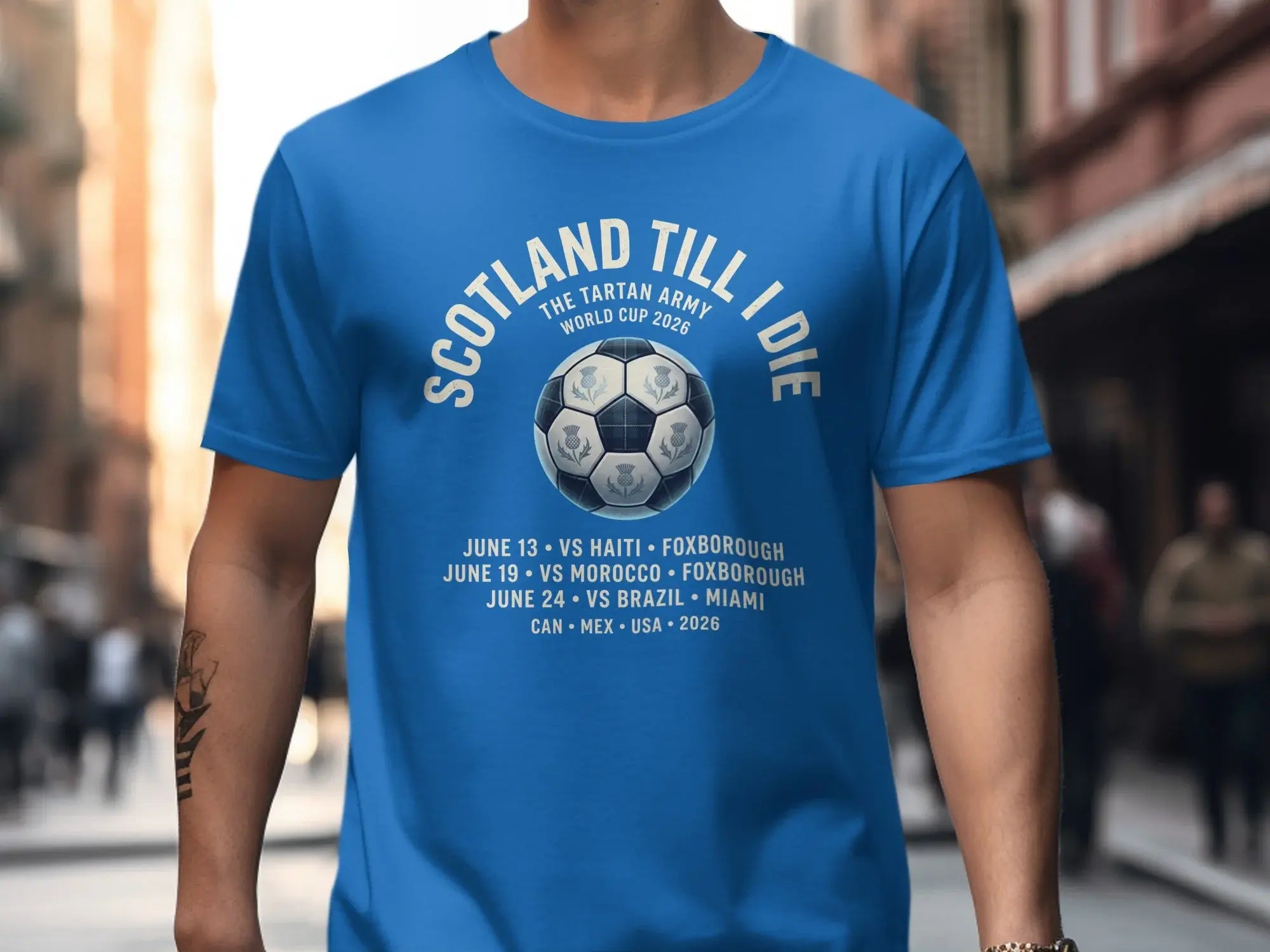 Blue t-shirt with Scotland World Cup 2026 matches and dates.