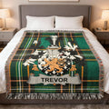 Tartan blanket featuring a coat of arms with the name TREVOR.