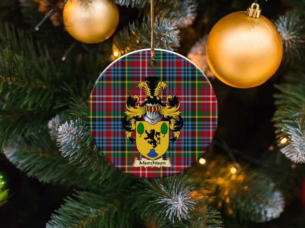 Murchison family emblem ceramic Christmas ornament with Caledonia tartan background in festive holiday décor