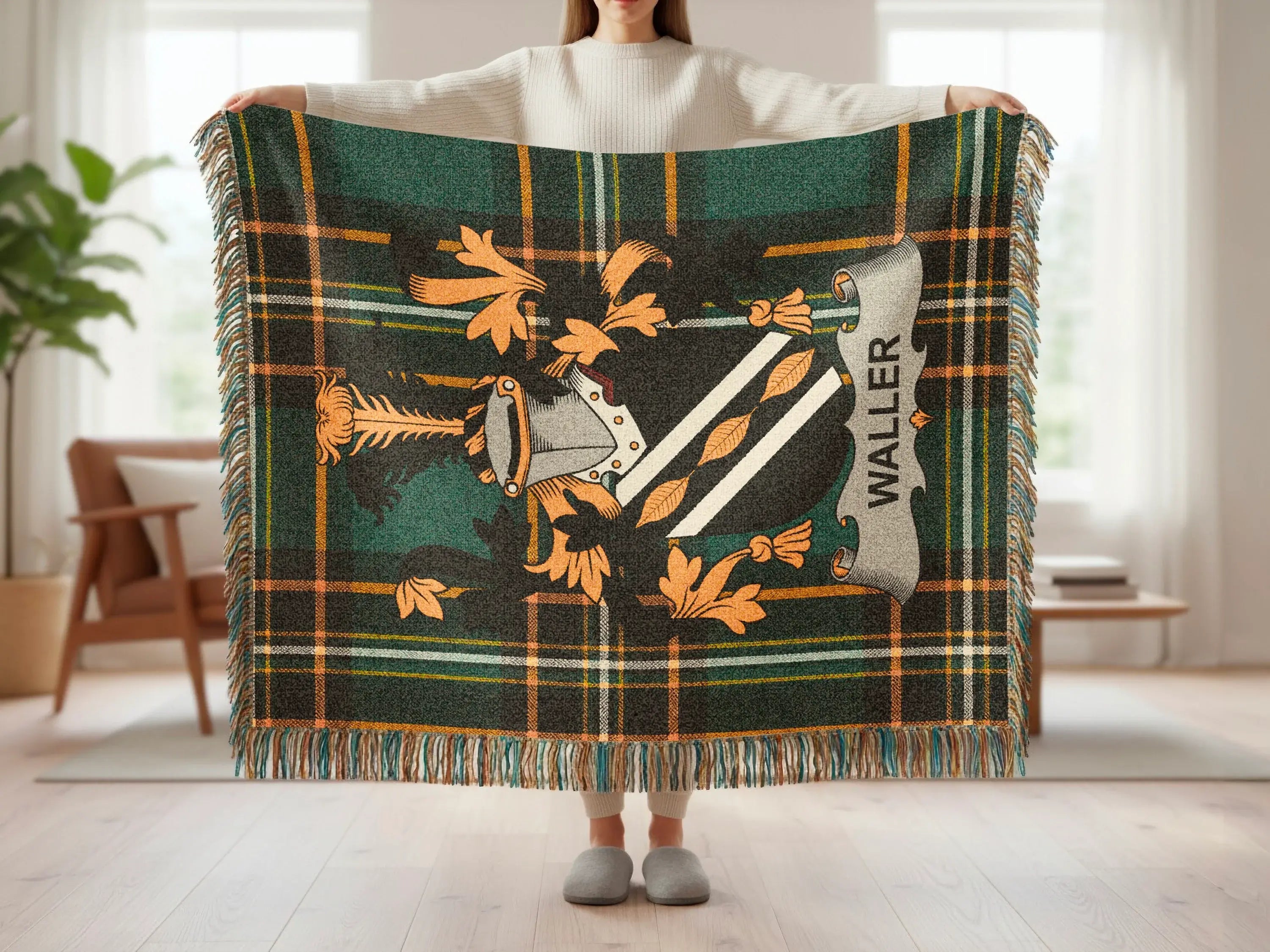 Tartan throw with Waller crest in center.