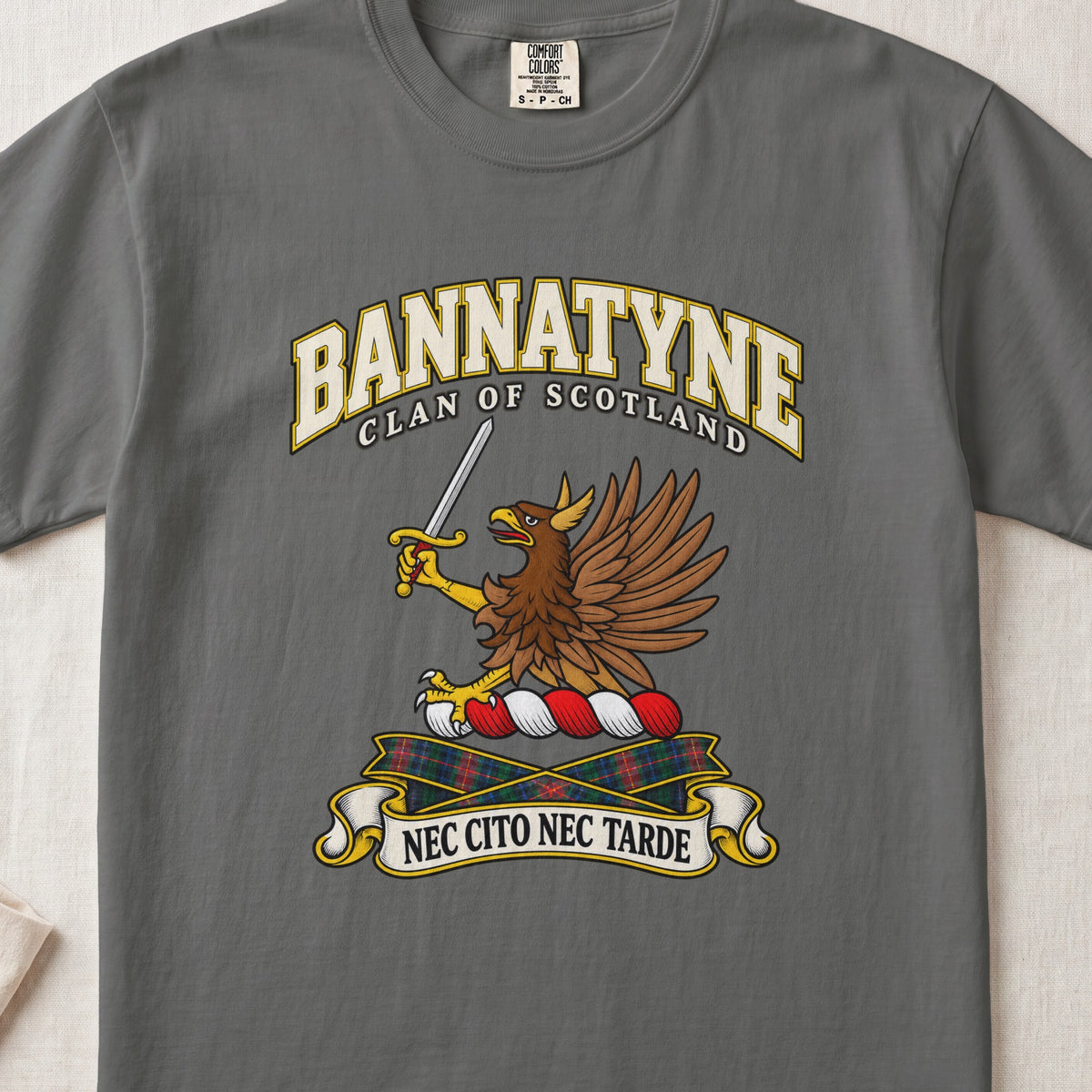 Bannatyne Scottish clan T-shirt in Pepper, front view with a brown eagle holding a sword and motto design.