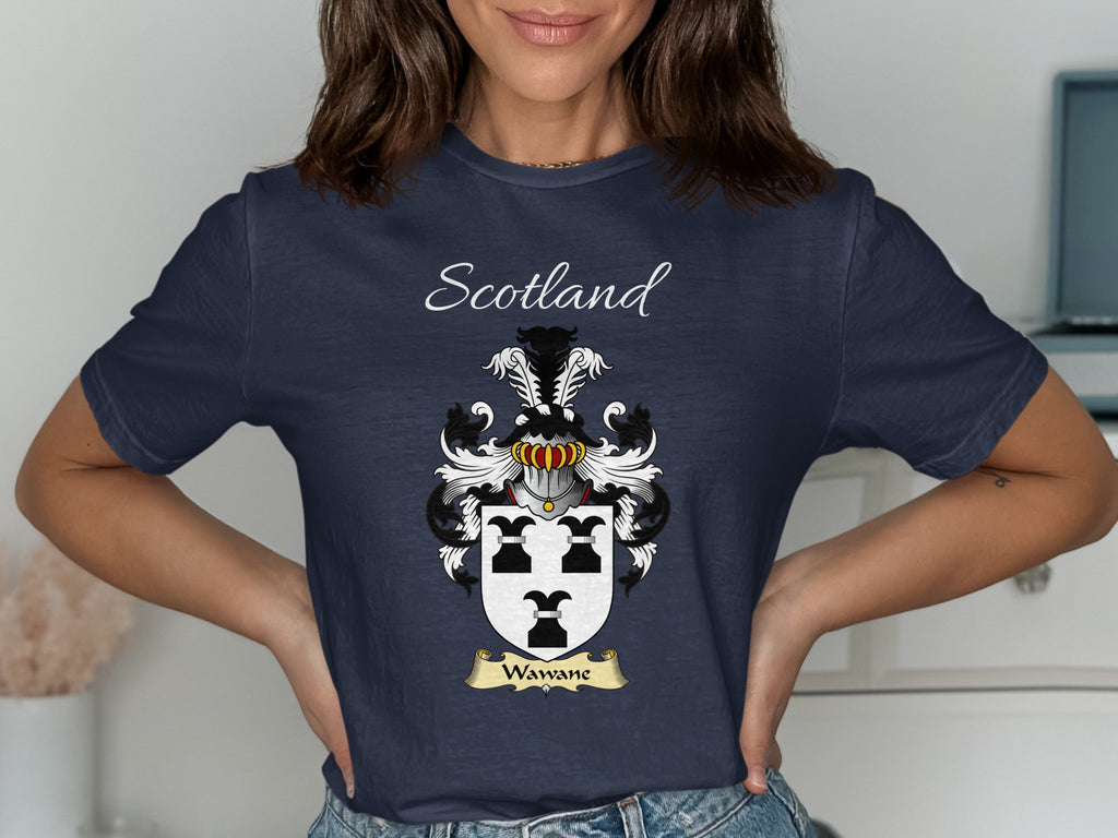 Model wearing the navy Wawane family crest T-shirt featuring “Scotland” and the surname banner.