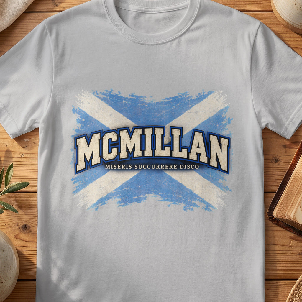 McMillan Scottish Saltire T-shirt in Sport Grey, with distressed blue and cream flag and “Miseris Succurrere Disco” lettering.