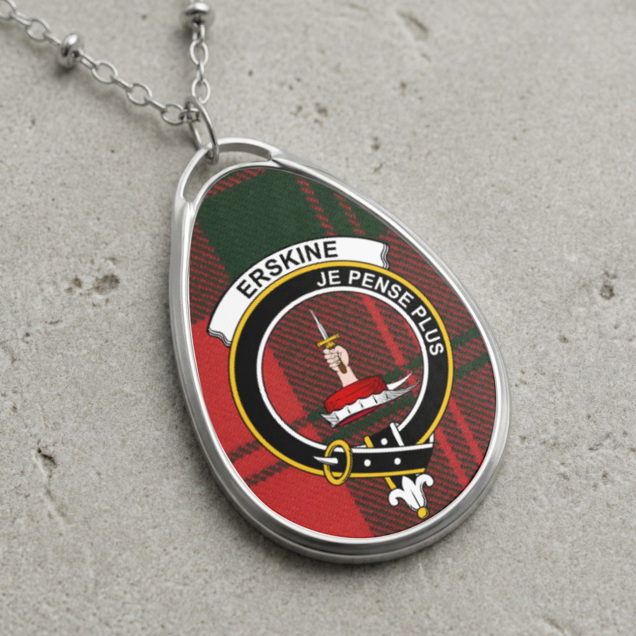 Erskine clan Scottish tartan necklace with clan crest and Je Pense Plus motto on tartan background