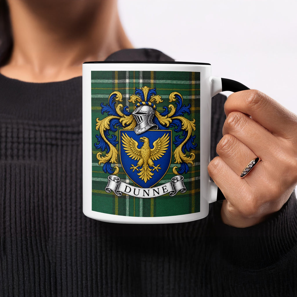 Dunne family crest on Irish National Tartan 11 oz ceramic mug, close-up view