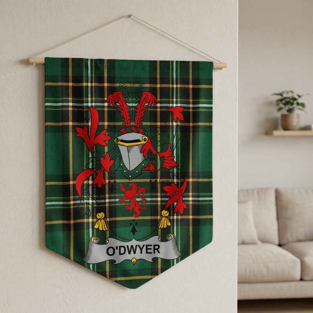 O'Dwyer family crest on a green tartan banner hanging on a wall.