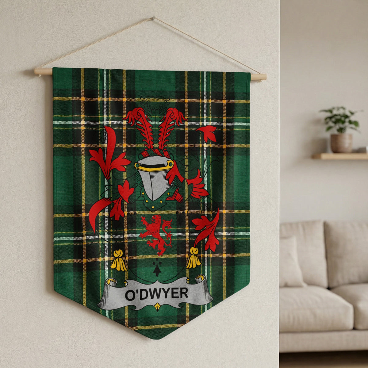 O'Dwyer family crest on a green tartan banner hanging on a wall.