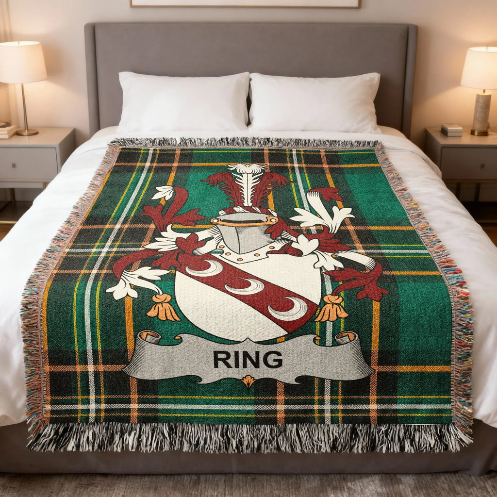 Plaid blanket with the Ring family crest displayed centrally.