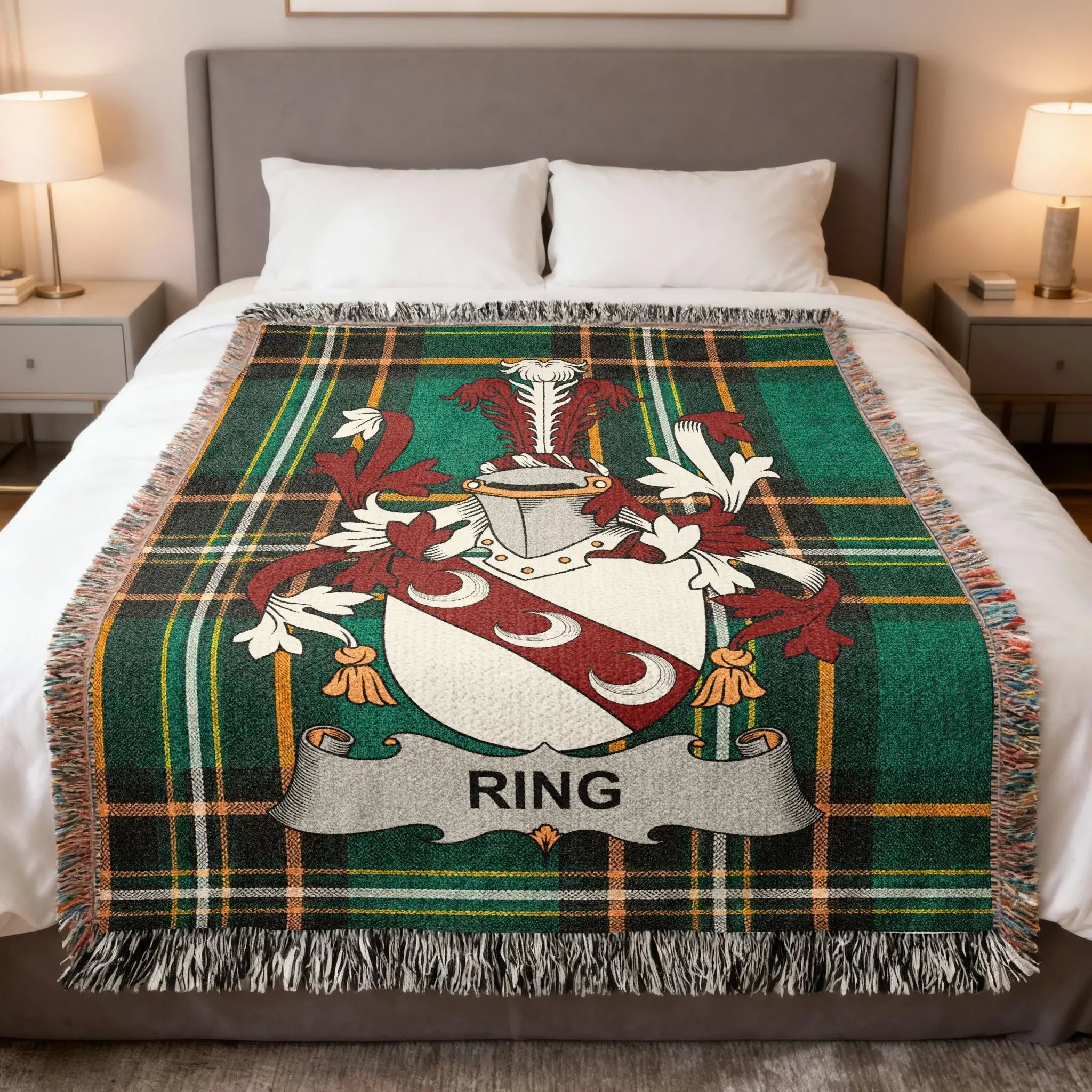 Plaid blanket with the Ring family crest displayed centrally.