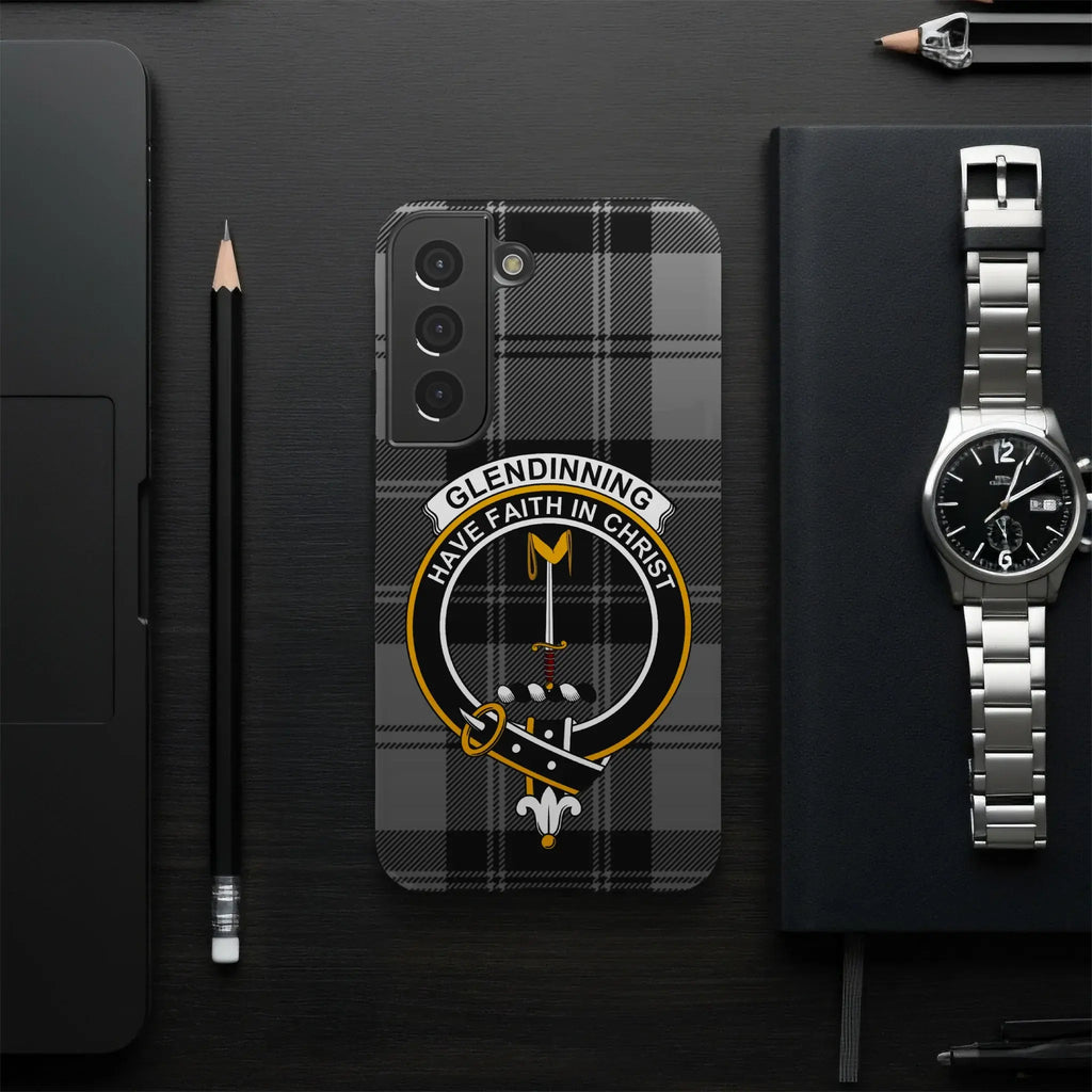 Glendinning clan crest and tartan phone case — edge-to-edge design on glossy slim case, side view
