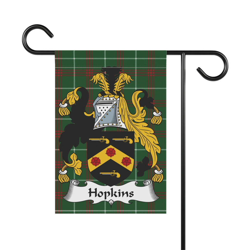 Hopkins family crest on a tartan background, displayed on a garden flag.