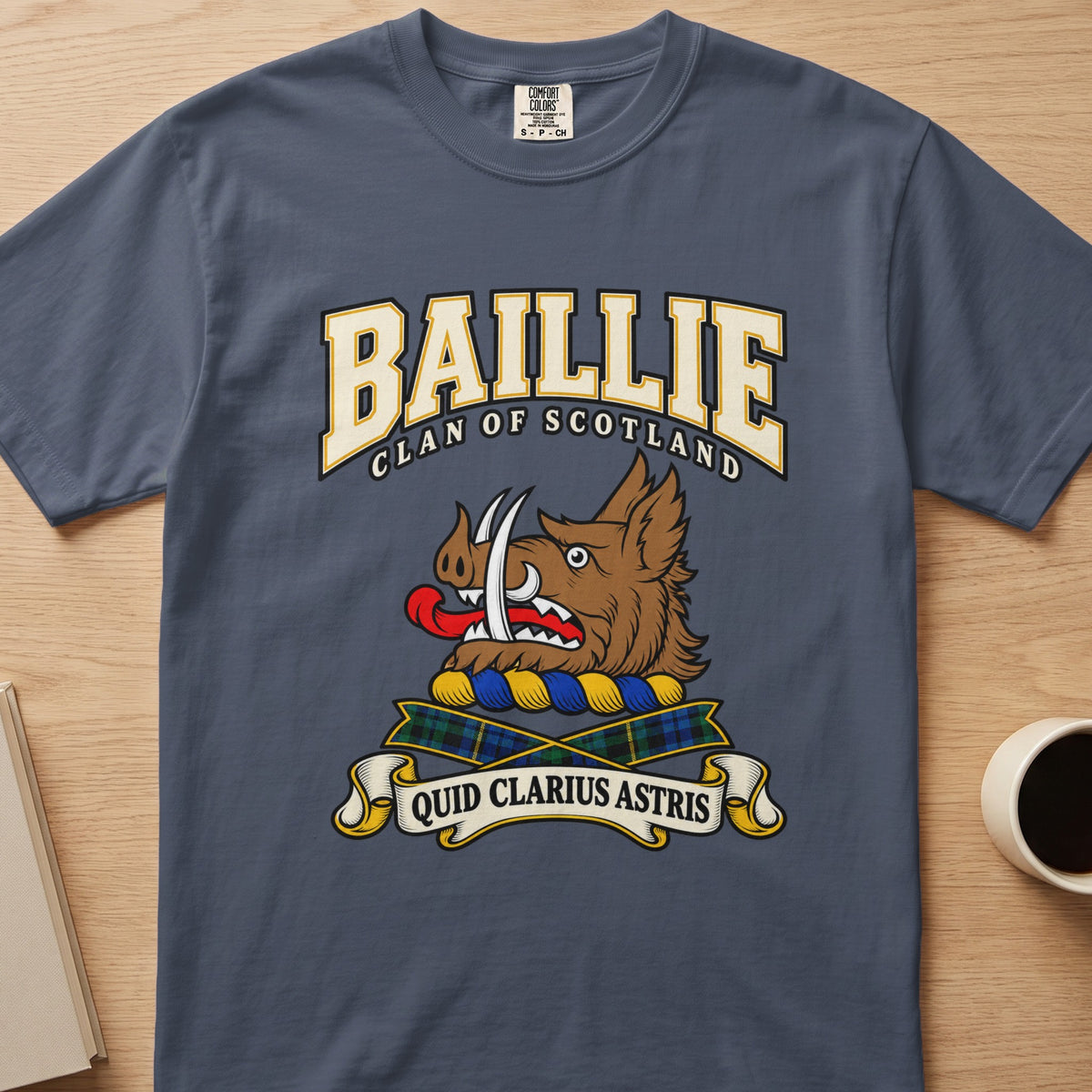 Baillie brown boar’s head with white tusks graphic on a slate blue Comfort Colors T-shirt, front view