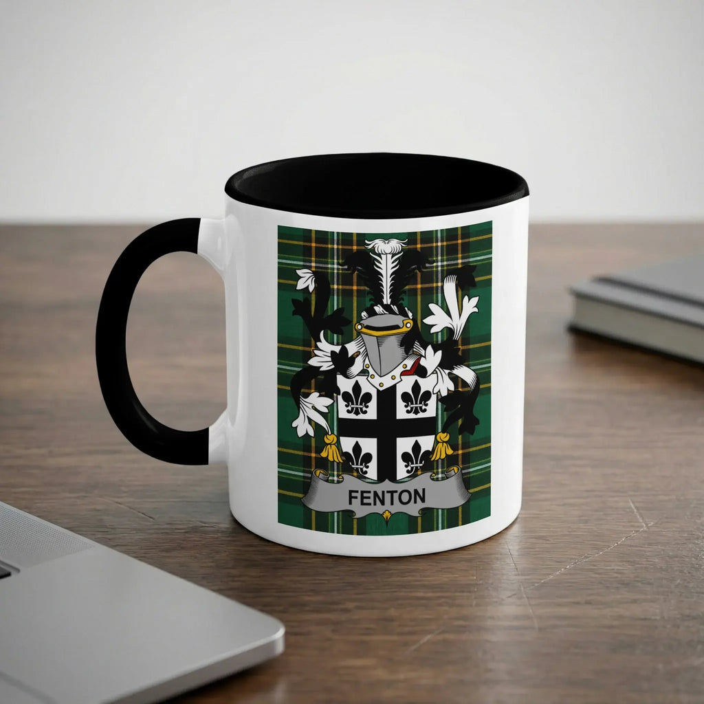 White mug with black handle featuring the Fenton family crest on a tartan background.