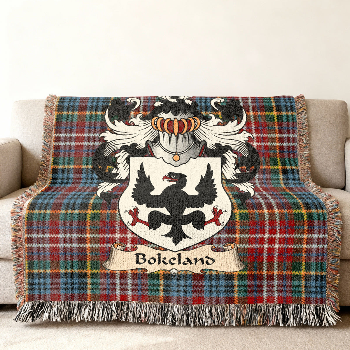 Bokeland Scottish family shield woven blanket on a Caledonia tartan background