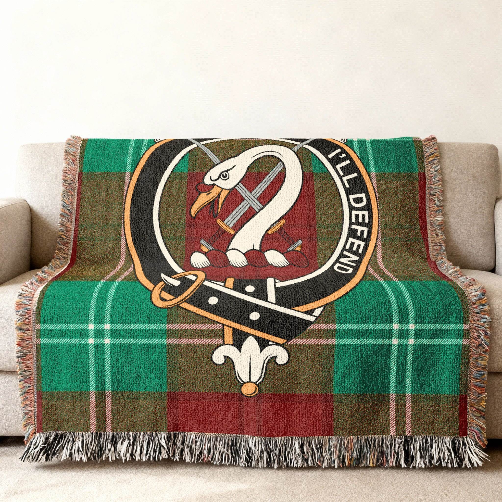 Clan Lennox woven blanket — 80x60 inch full size, I'll Defend crest and tartan on sofa display