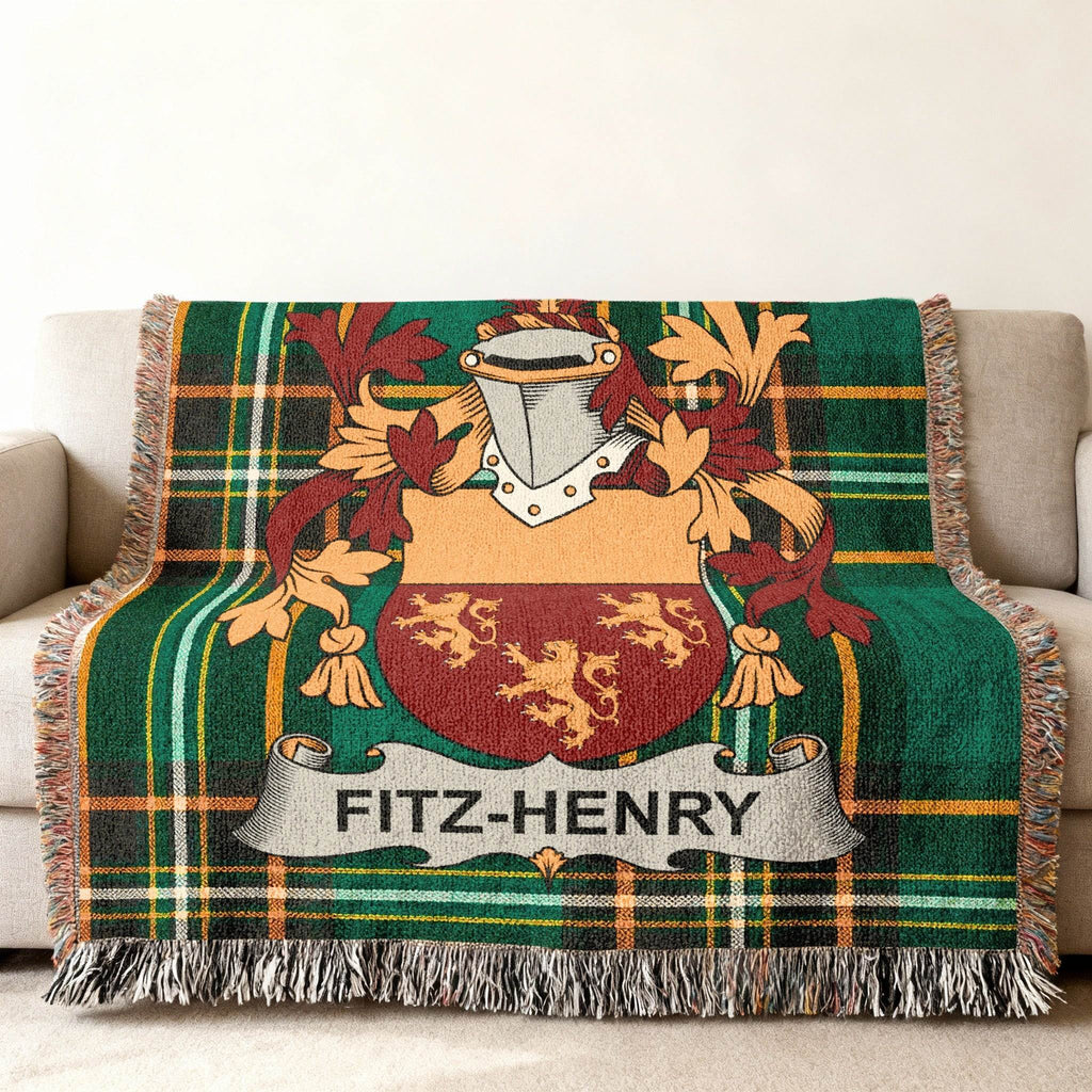 Green tartan throw blanket with FITZ-HENRY family crest.