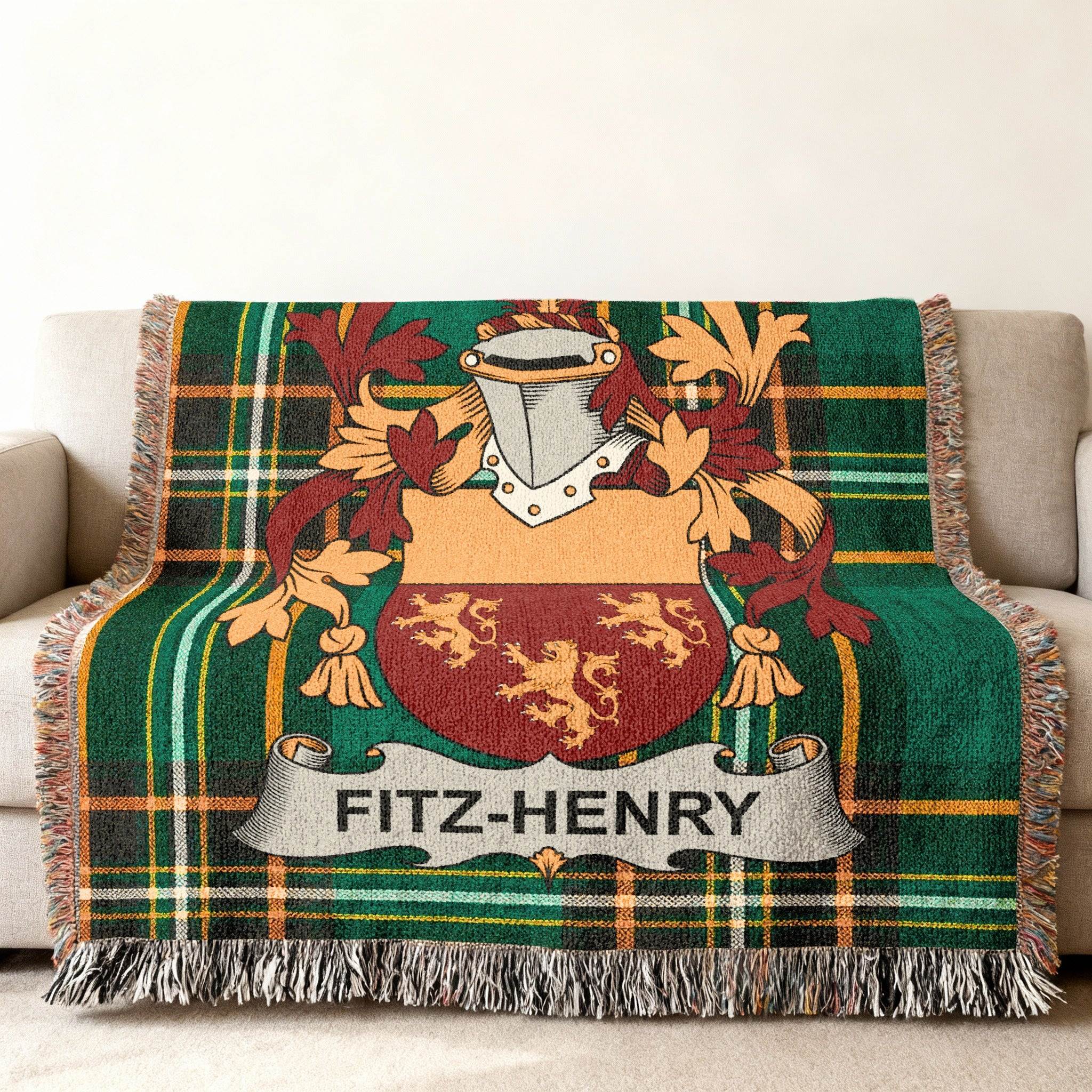 Green tartan throw blanket with FITZ-HENRY family crest.