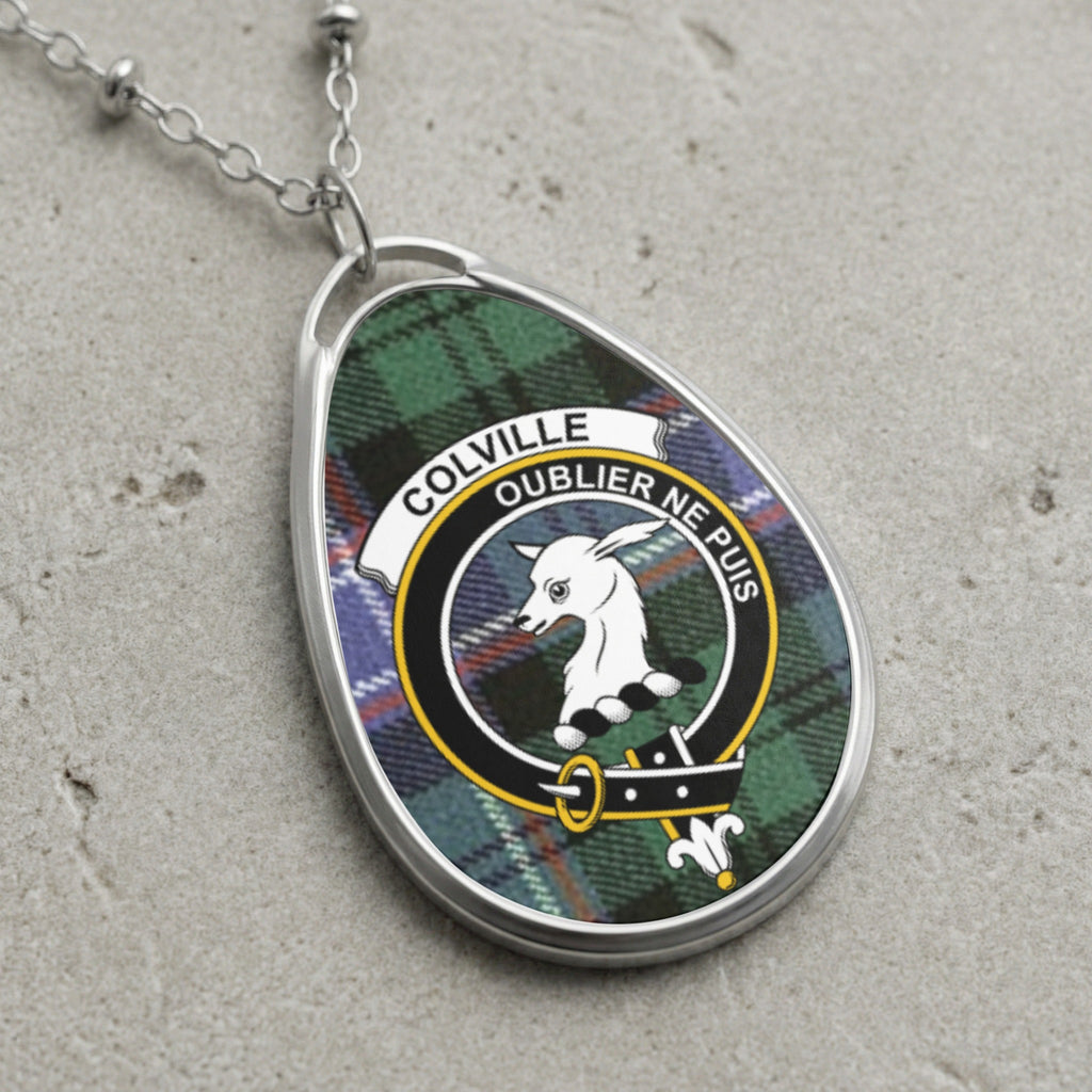 Colville clan Scottish tartan necklace with clan crest and Oublier Ne Puis motto on tartan background