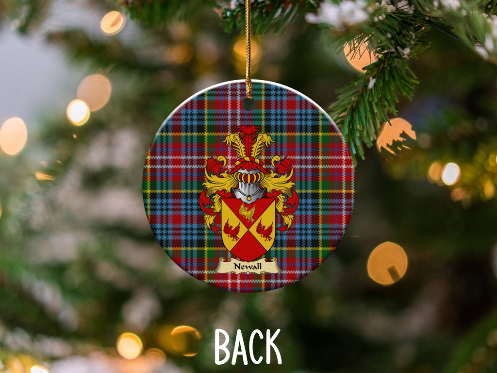 Newall ceramic ornament detail showing a double-sided family shield on a Caledonia tartan background