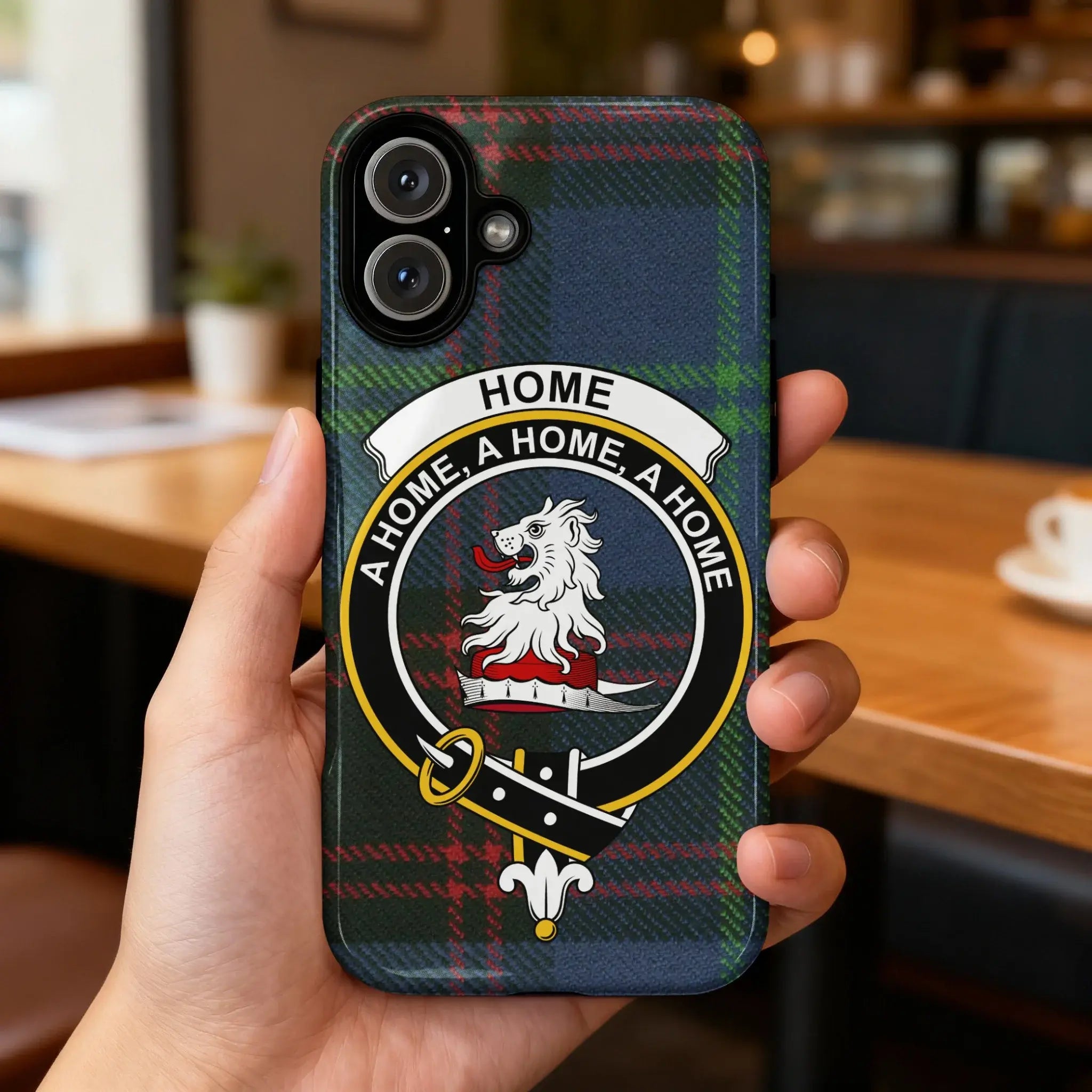 Home tartan crest lion design phone case flat lay — full A Home A Home A Home clan design visible