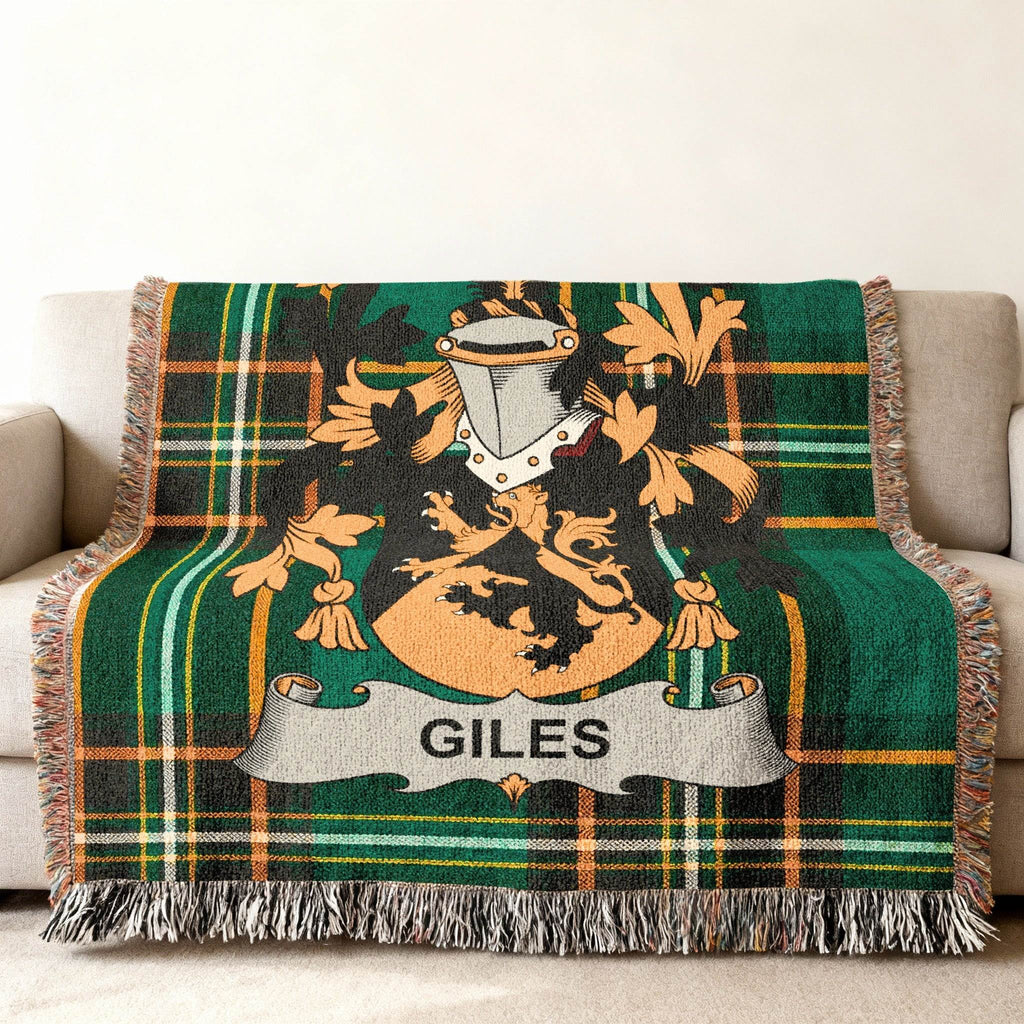 Green tartan throw blanket with Giles family crest.
