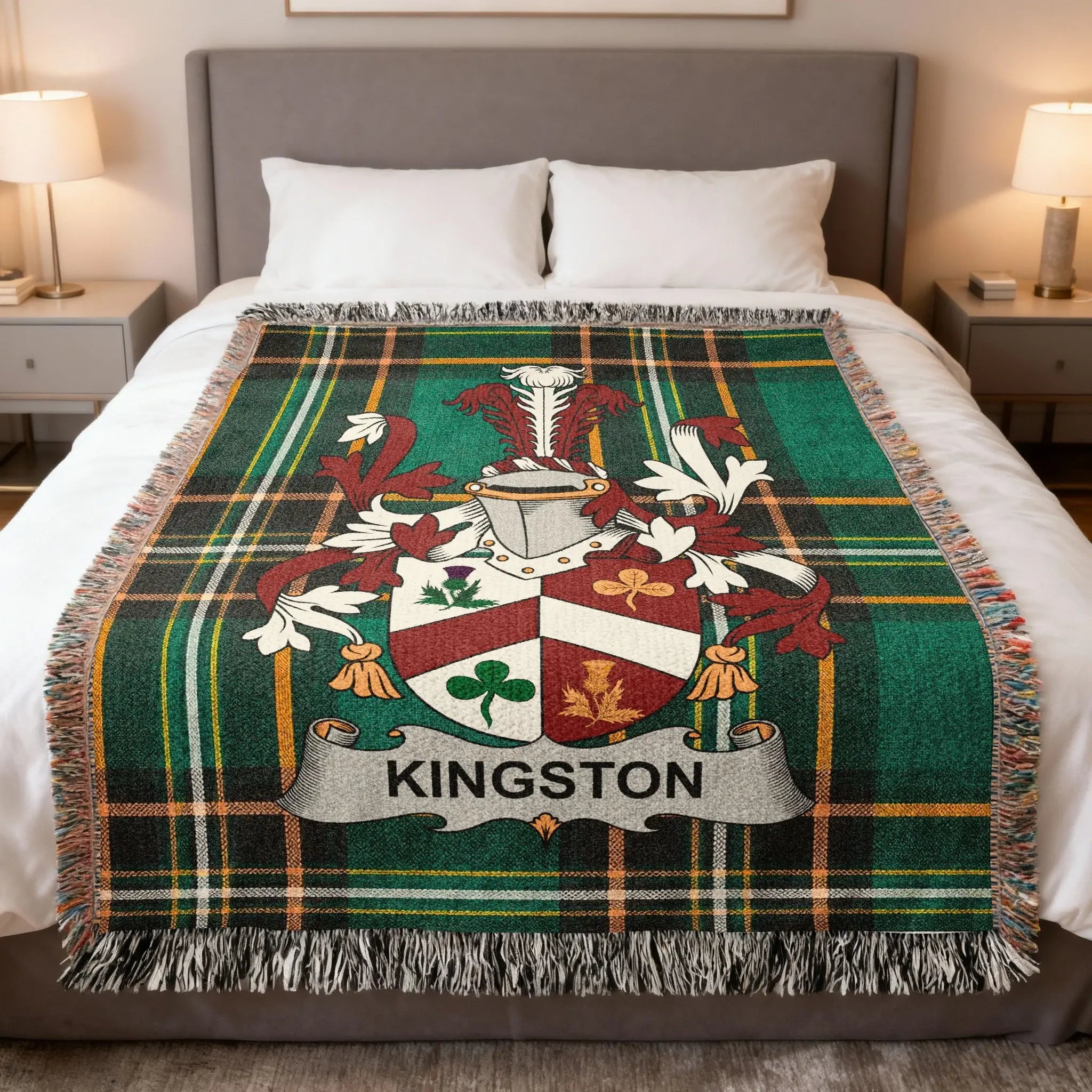 Green tartan blanket with Kingston family crest centered.