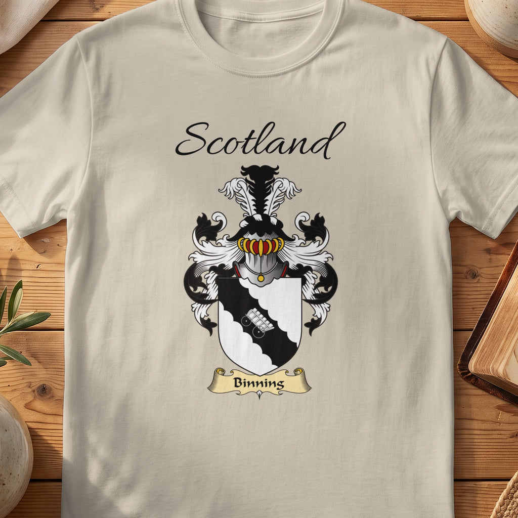 Sand Binning Scottish family shield T-shirt featuring a pale linked-hands motif on a black diagonal band
