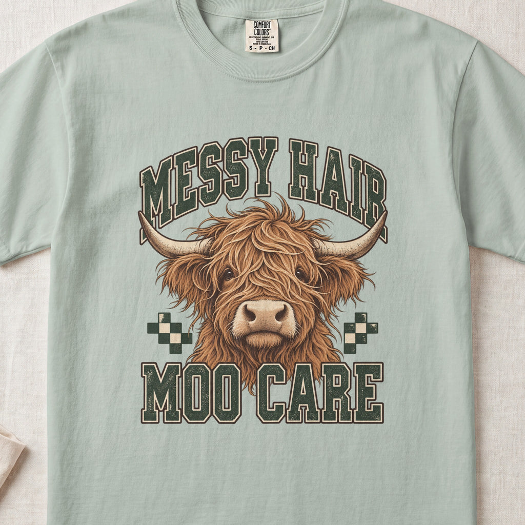 Messy Hair, Moo Care Highland cow design on a Bay Comfort Colors 1717 T-shirt, flat lay