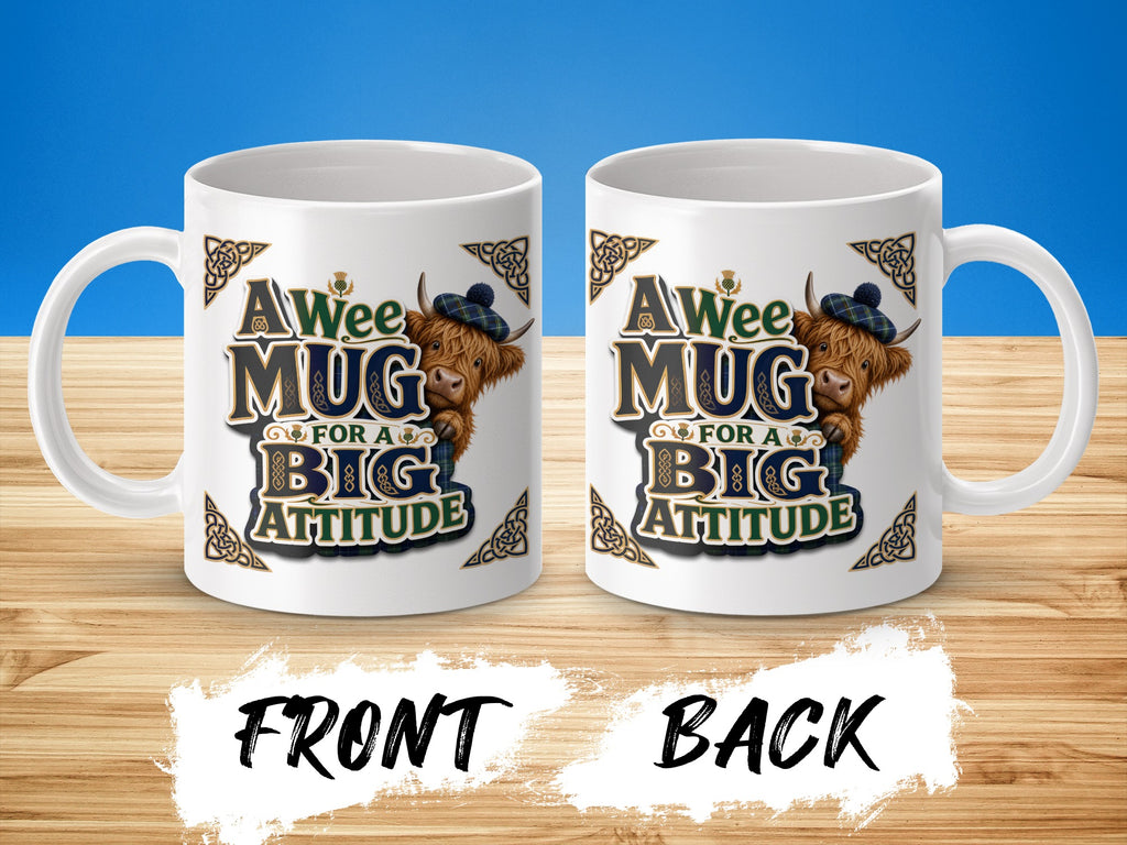Mug with "A Wee Mug for a Big Attitude" and Highland cow graphic.