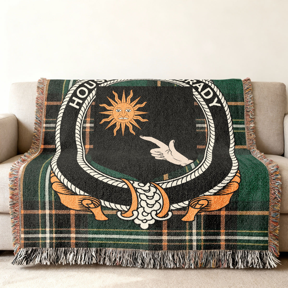 MacBrady Irish National Tartan woven blanket displayed on a sofa