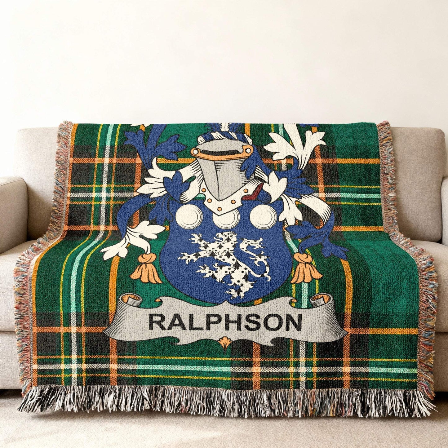 Green plaid throw blanket featuring the Ralphson family crest.