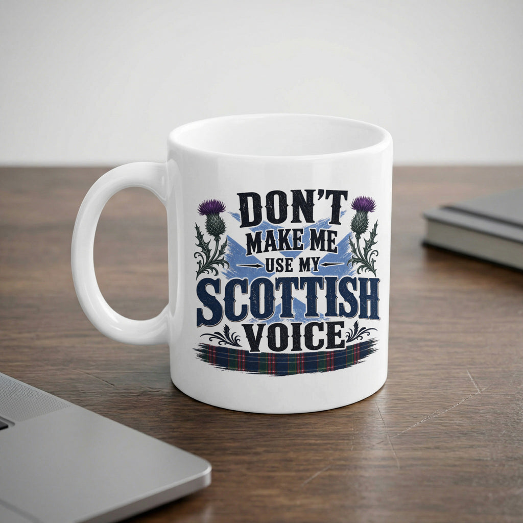 White mug with Scottish flag, thistles, and "Don't Make Me Use My Scottish Voice" text.