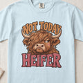 Not Today Heifer Highland cow design on a Chambray Comfort Colors 1717 T-shirt, flat lay