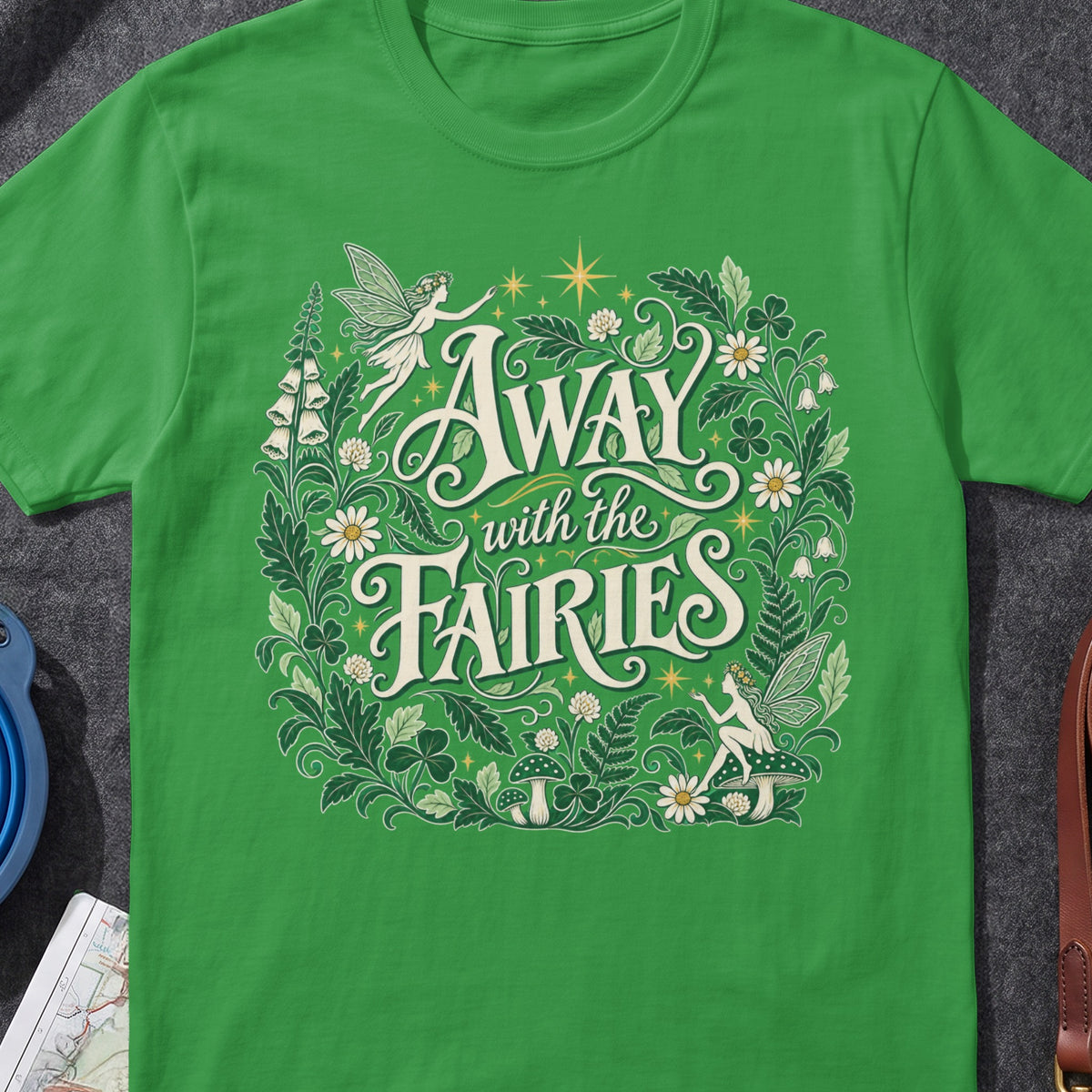 Away With The Fairies funny Irish T-shirt in Irish Green, flat-lay mockup