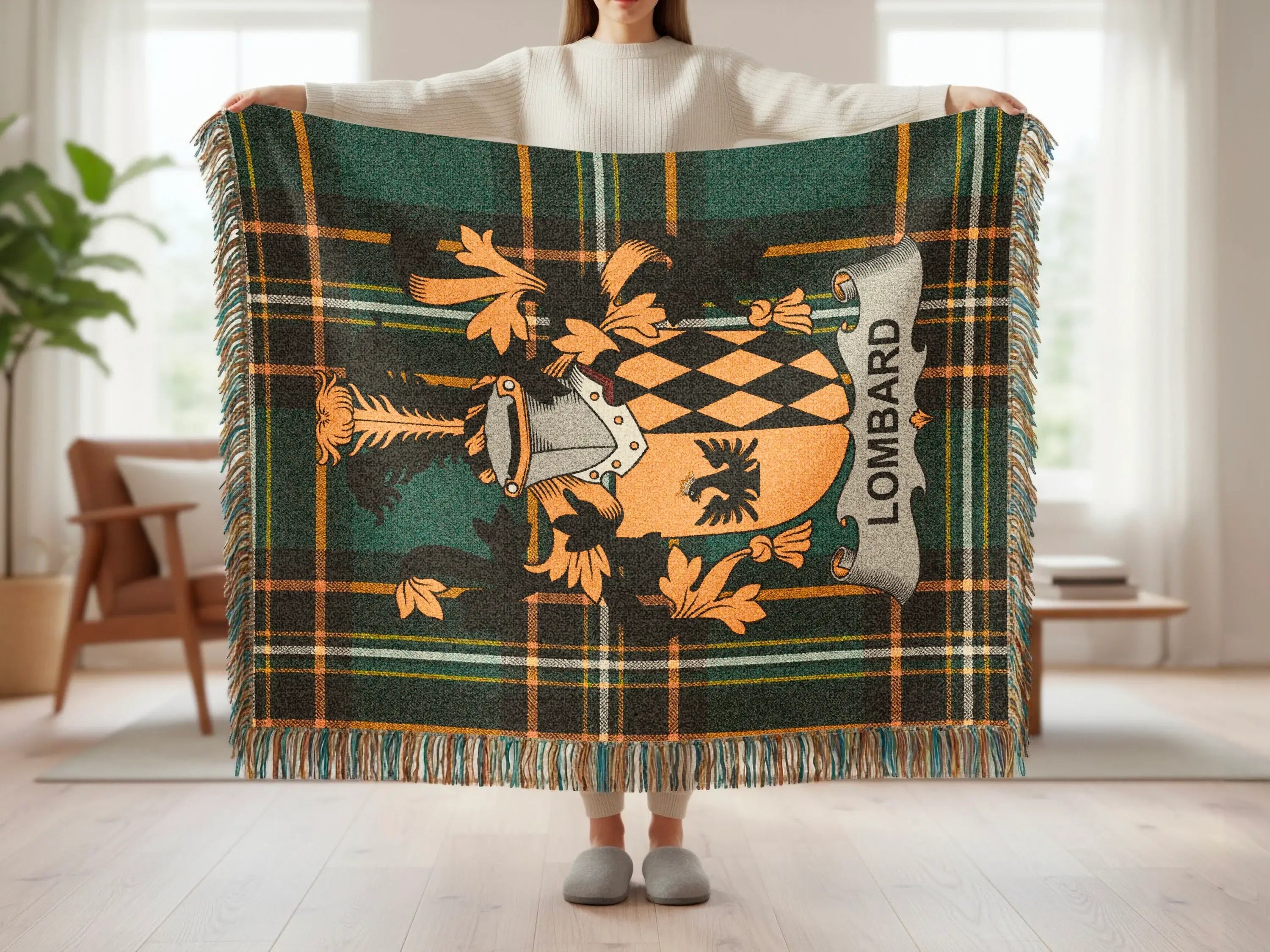 Tartan throw blanket with Lombard crest, held by a person.