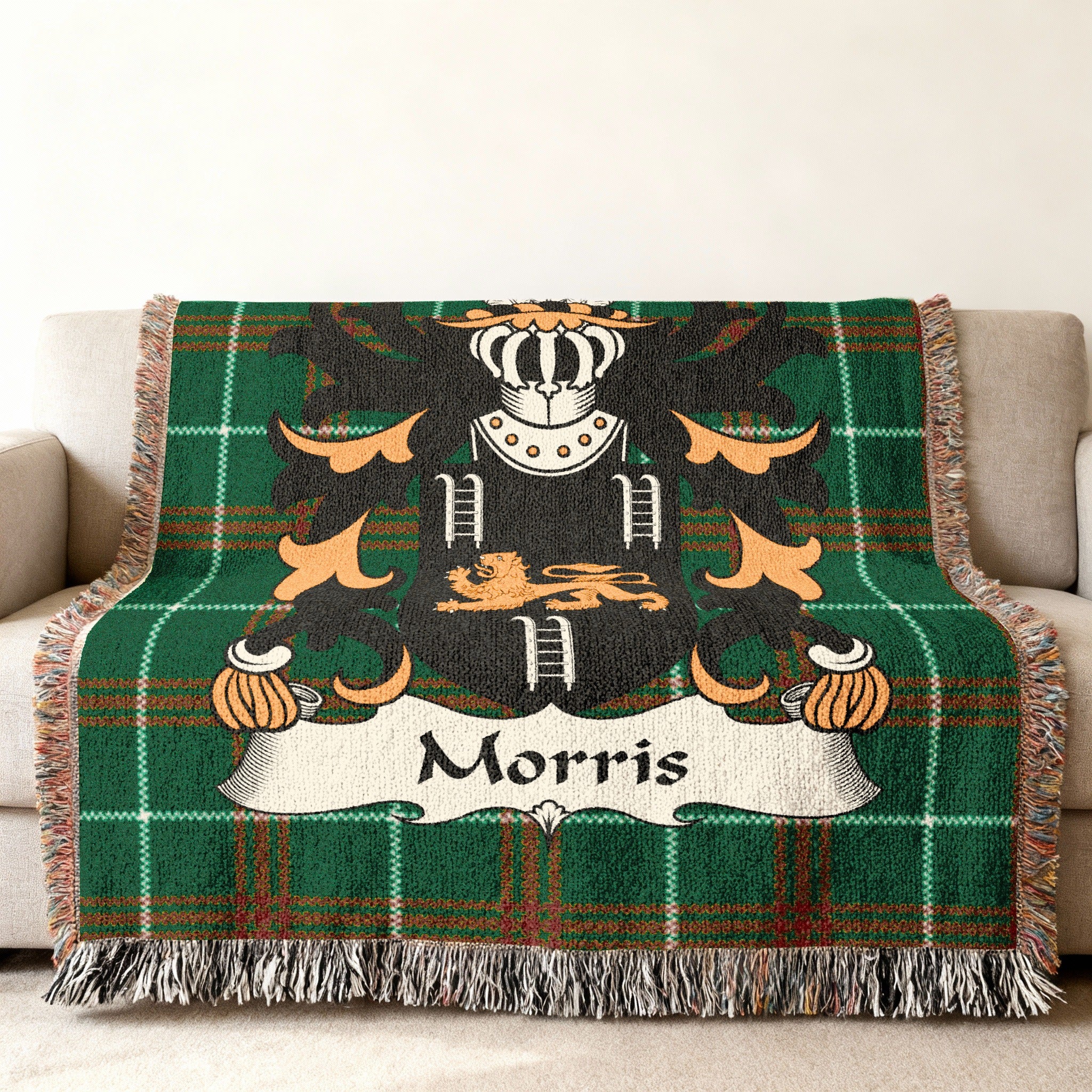 Green plaid blanket with Morris family crest and lion.