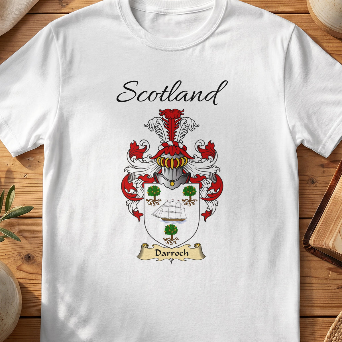White Darroch Scottish family shield T-shirt featuring a ship and green tree motifs on a pale shield