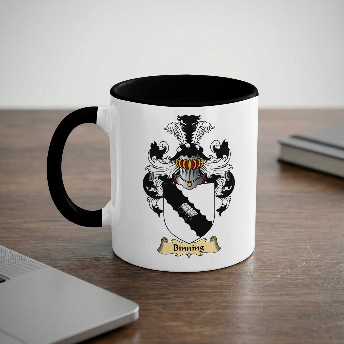 White mug with black rim featuring the Binning family crest and name.